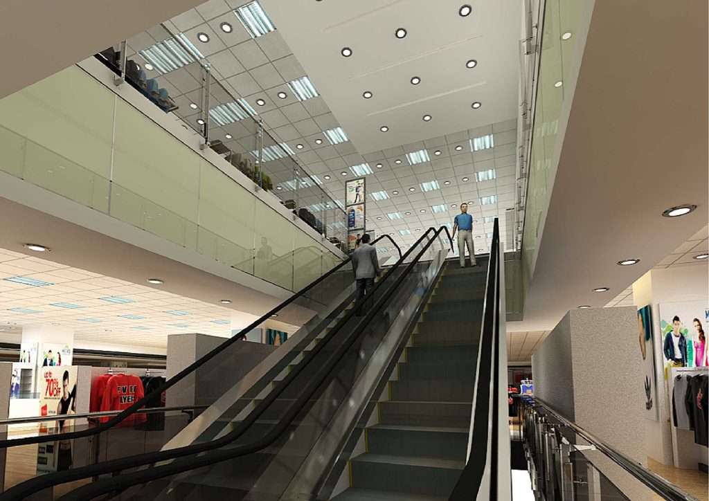 Multi-level retail space with escalators, glass railings, and ceiling lights