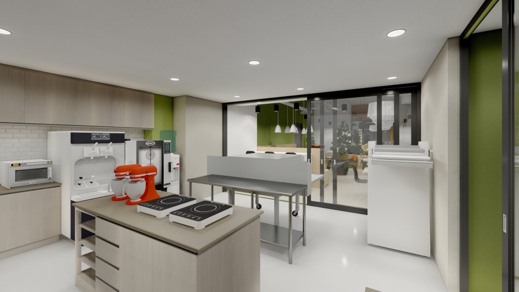 Professional kitchen with white cabinetry and stainless steel counter