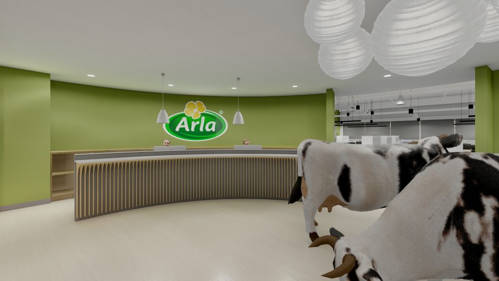Reception area with curved desk and green walls